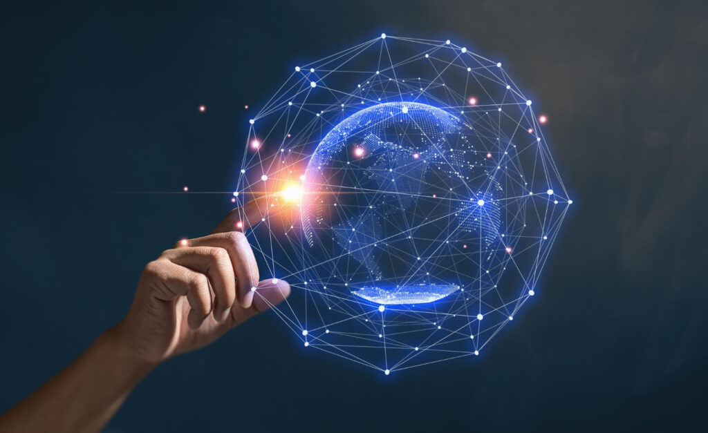A hand touching a glowing digital network sphere with a holographic globe inside, symbolizing global connectivity, technology, and data networks.